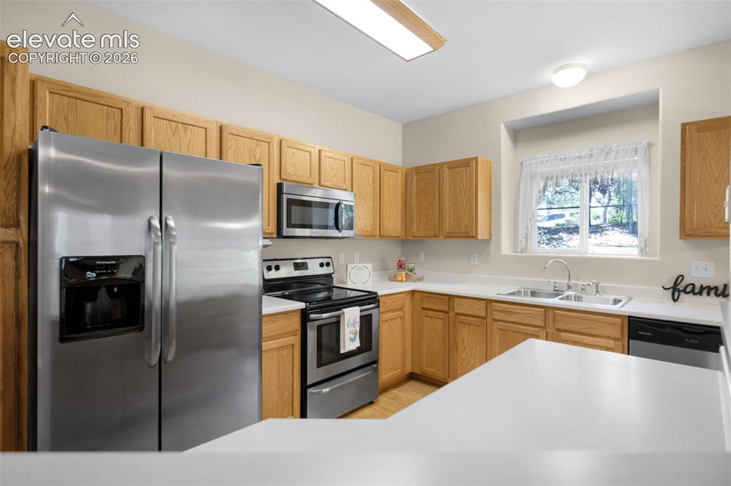Image 10 of 43: All stainless steel appliances & pantry