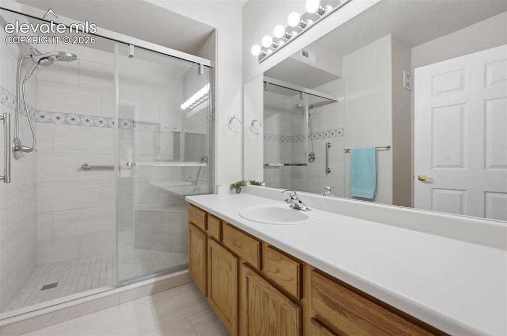 Image 19 of 43: Easy access shower in master bath!