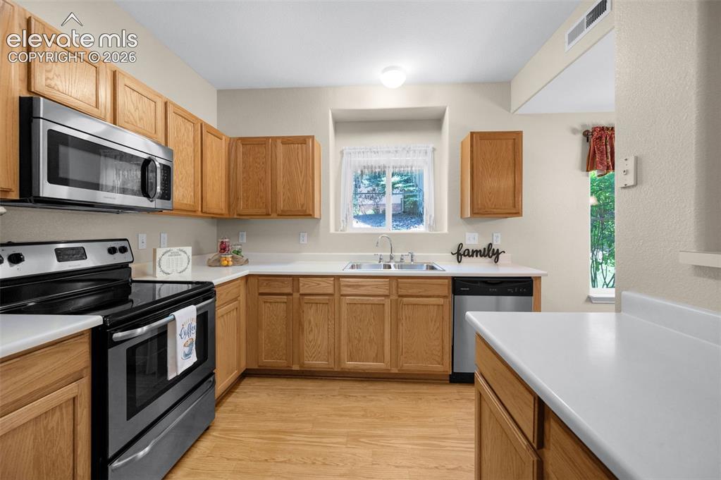 Image 7 of 43: All stainless steel appliances & pantry