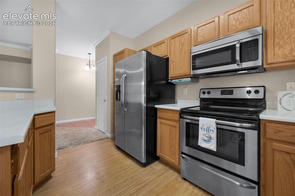 Image 8 of 43: All stainless steel appliances & pantry