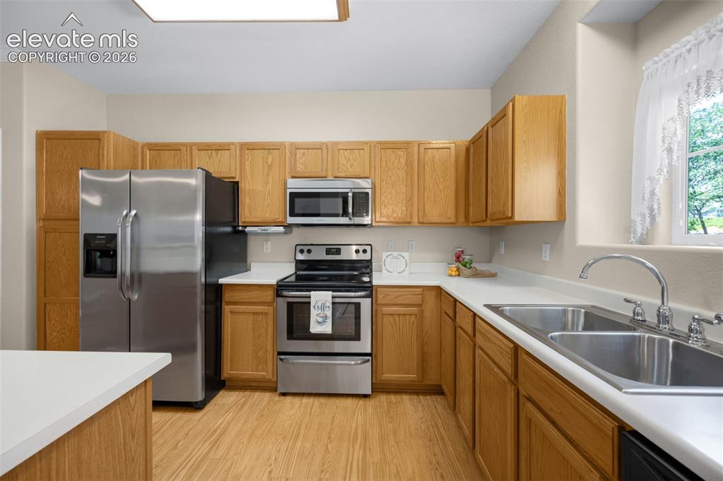 Image 9 of 43: All stainless steel appliances & pantry