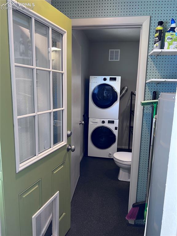 Image 15 of 30: Laundry and half bath. Correct color on back door