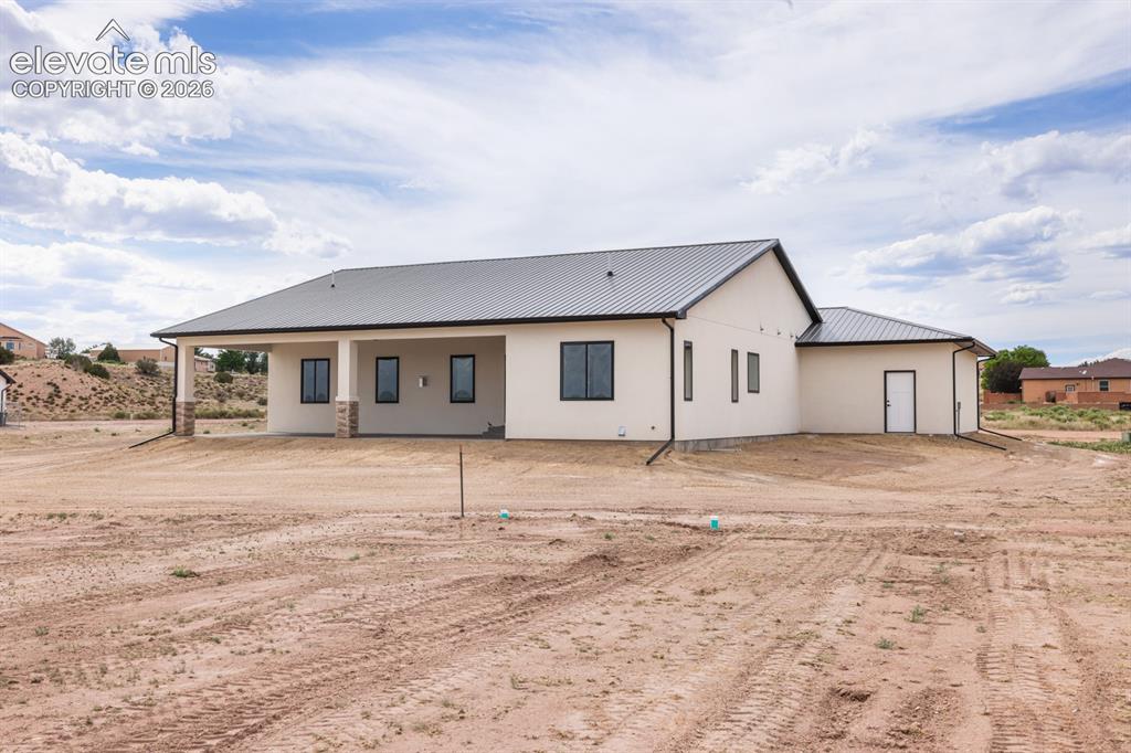 Image 42 of 48: Back of house