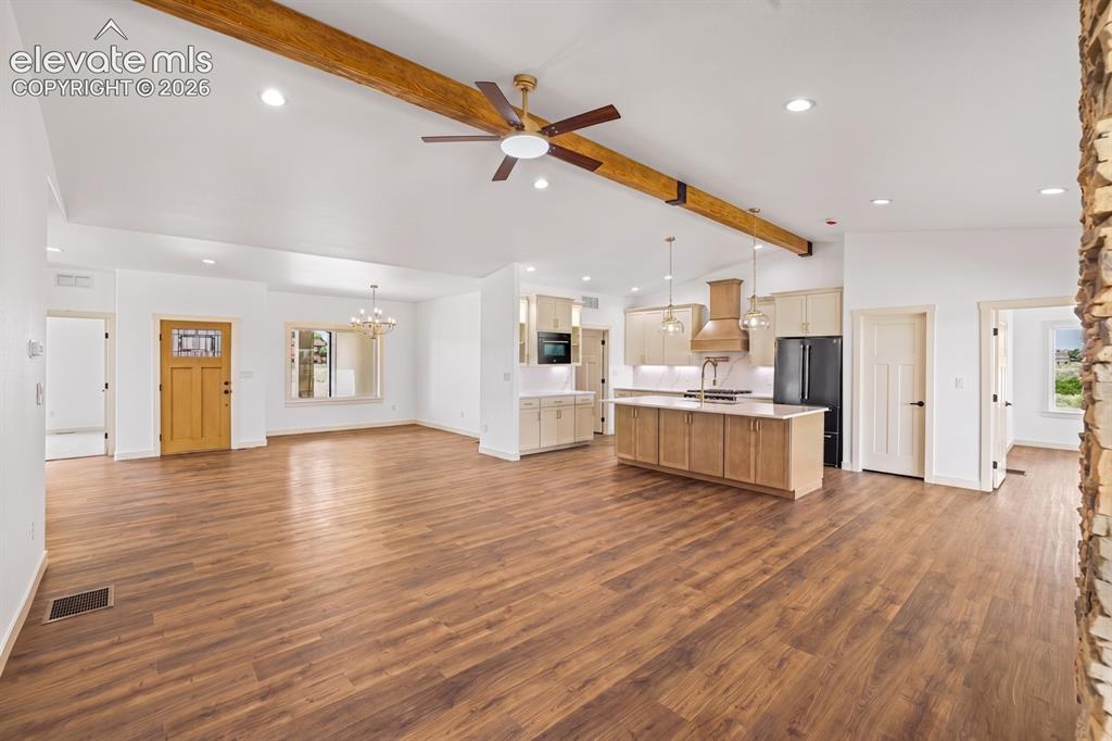 Image 6 of 48: Front door, Kitchen and dinning