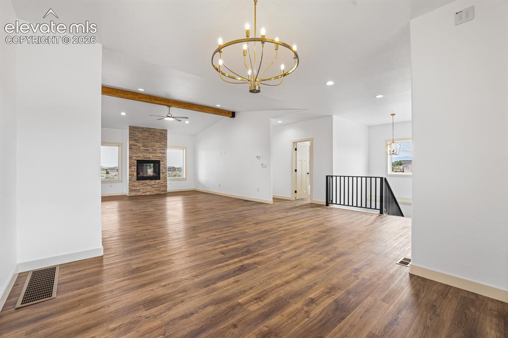 Image 7 of 48: dinning, stairs and living 