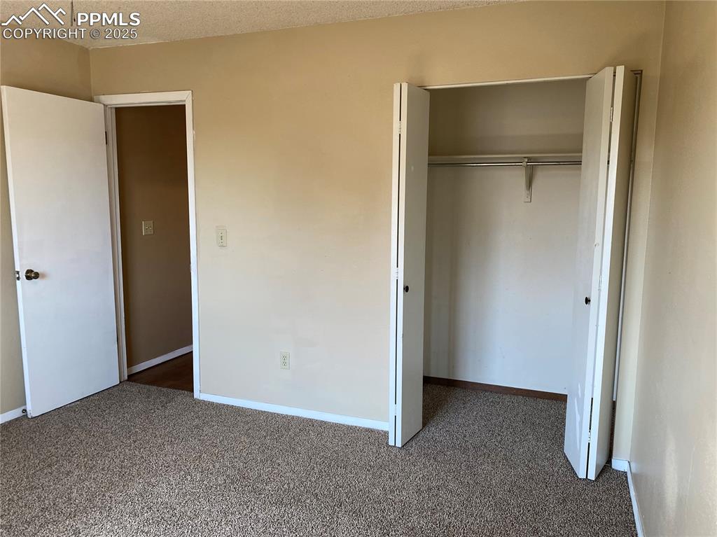 Image 10 of 15: with carpet, and second closet