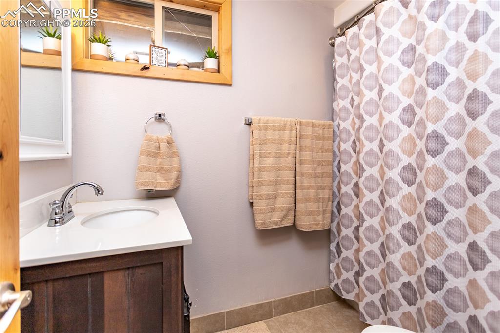 Image 27 of 41: Basement full bath