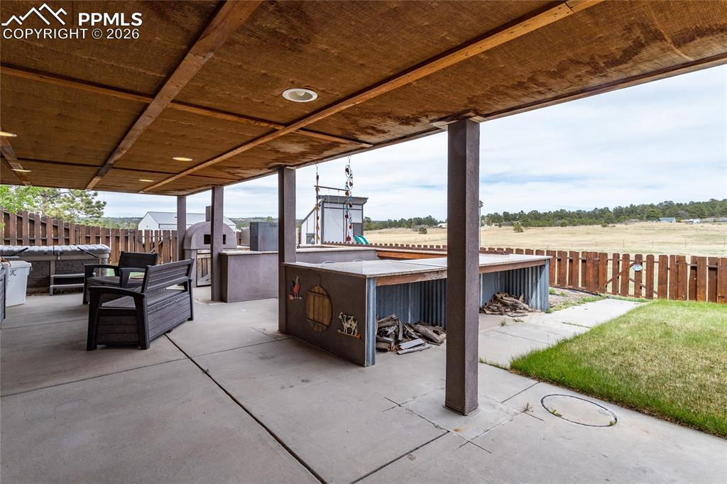 Image 28 of 41: Covered Patio