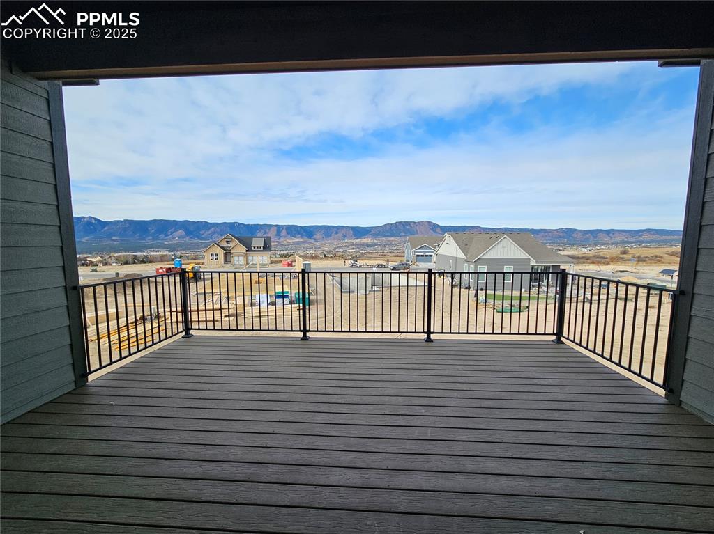 Image 5 of 20: Wooden deck featuring a mountain view