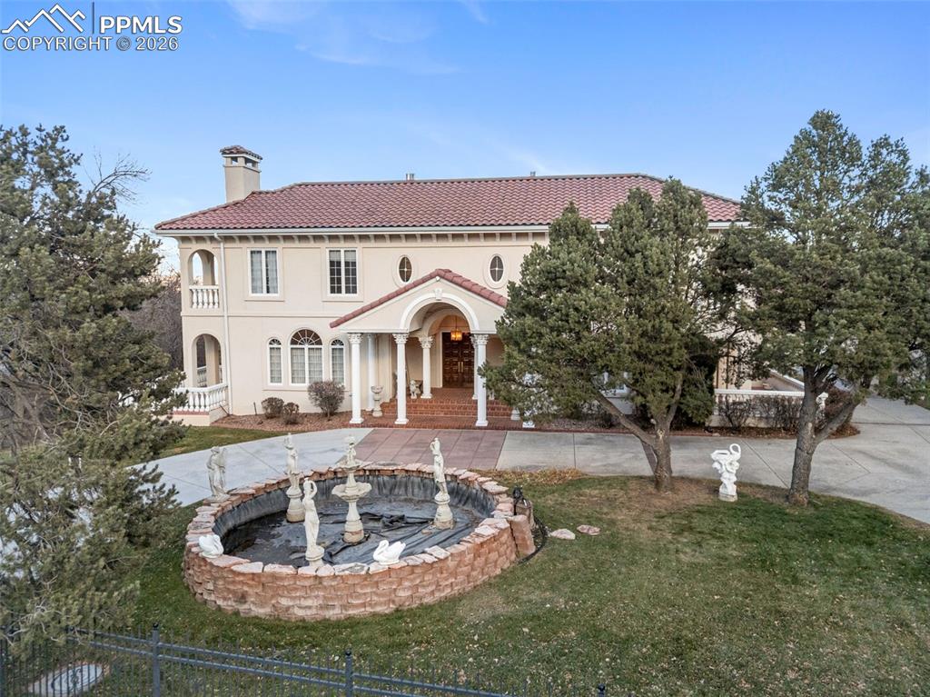 Caption: front of Home with Water foutain