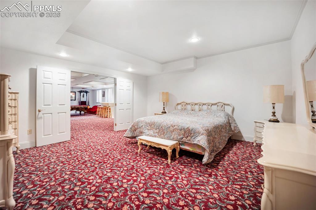 Image 39 of 50: Basement Bedroom