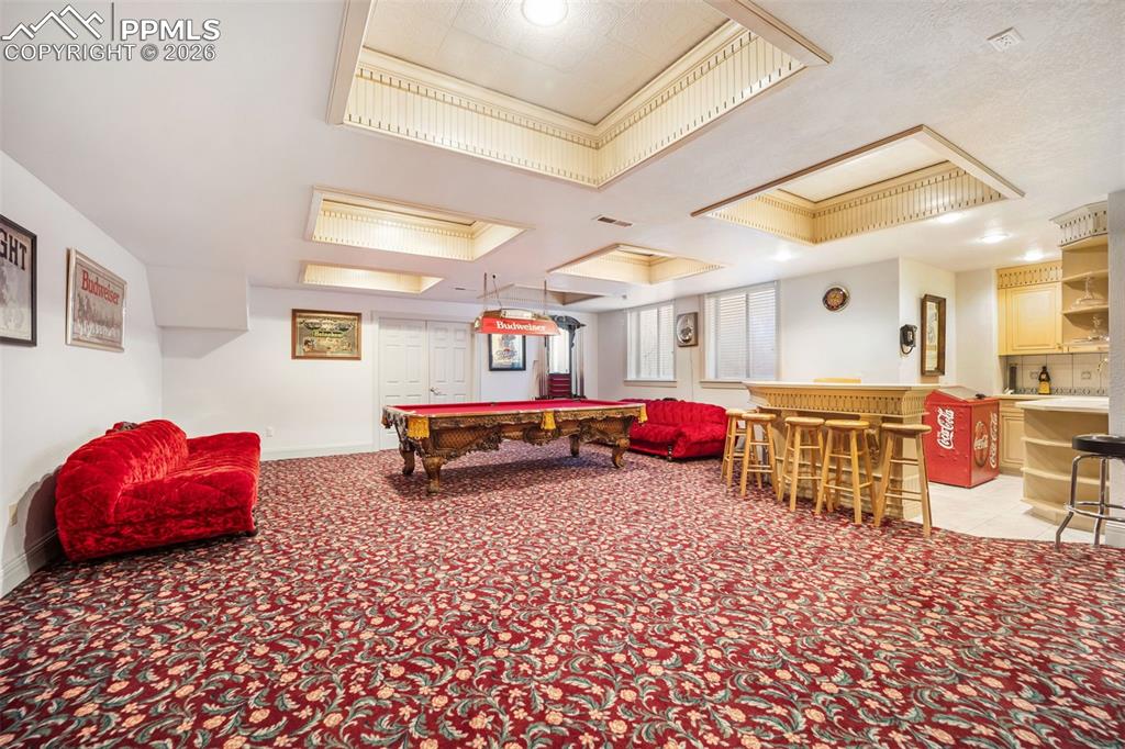 Image 42 of 50: Basement with Bar