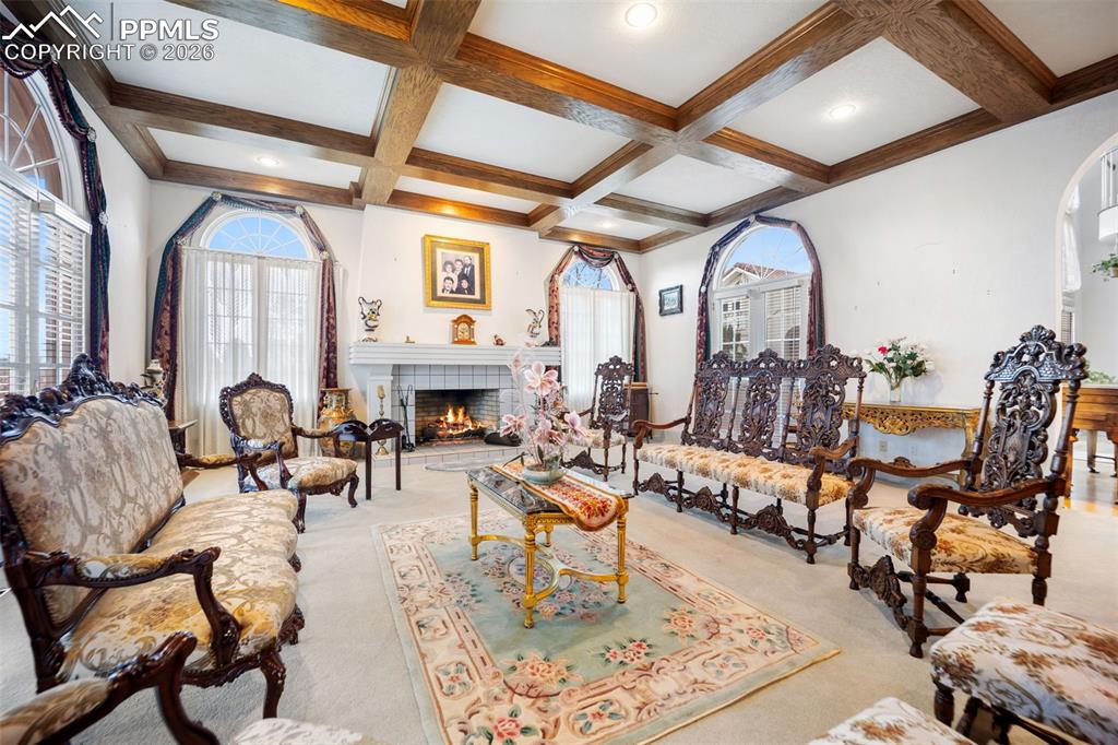 Image 8 of 50: Family Room with French Doors