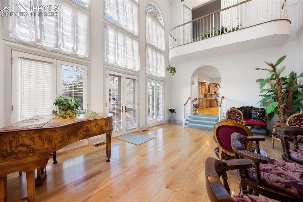 Image 9 of 50: Sun Room with vaulted ceilings