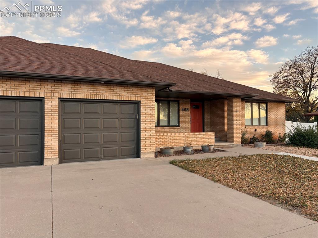 Image 46 of 47: Updated new paint on trim and garage doors (professional photos pending)