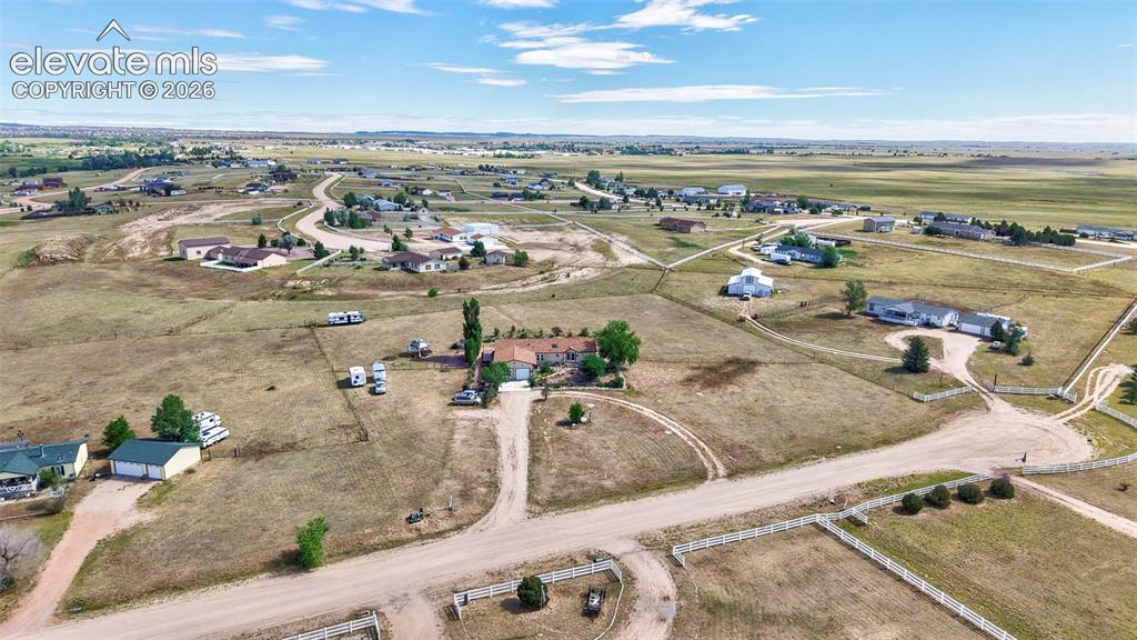 Image 11 of 38: Expansive rural landscape featuring scattered residences and extensive open