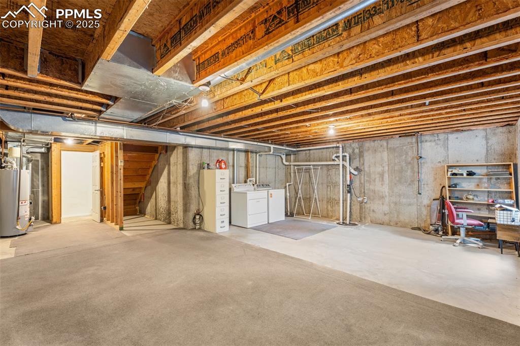 Image 22 of 32: Spacious unfinished basement offering endless possibilities for customizati