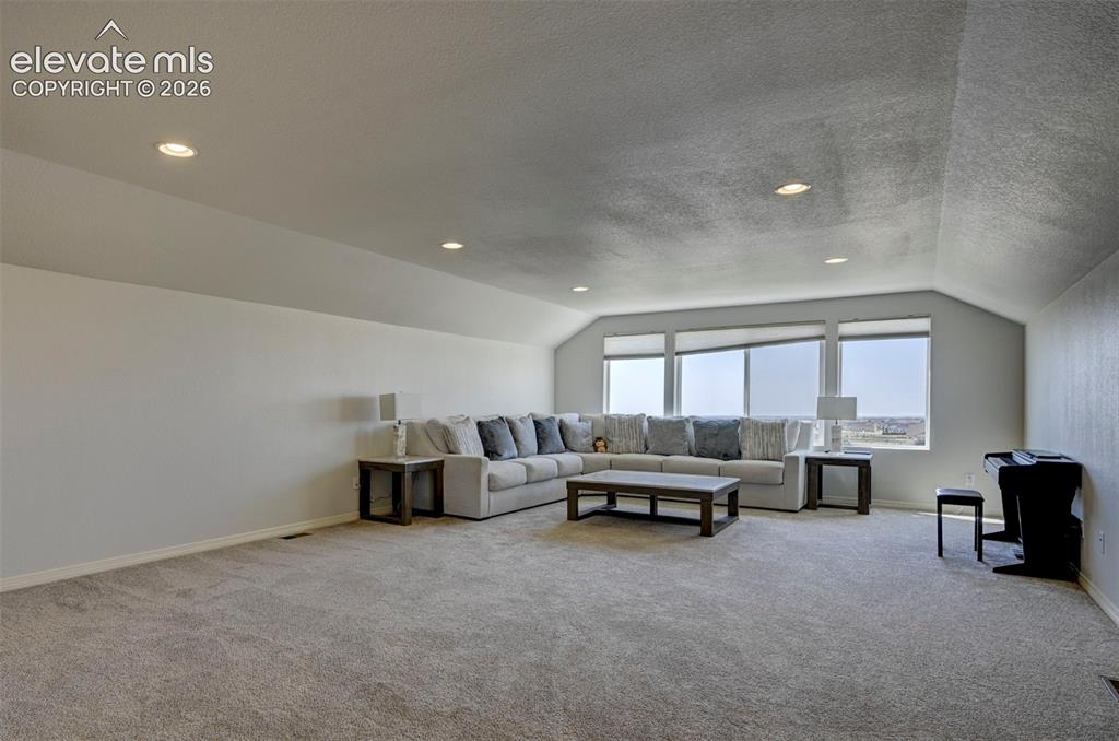 Image 31 of 45: 3rd Floor featuring broad windows with roller shades, recessed lighting, an