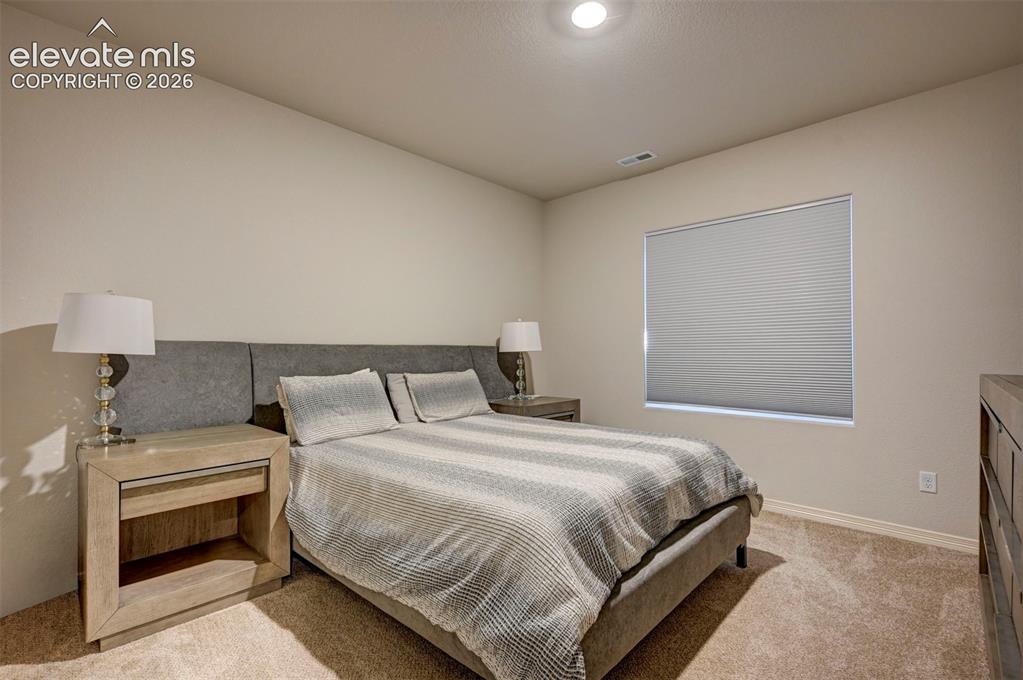 Image 39 of 45: Basement Bedroom