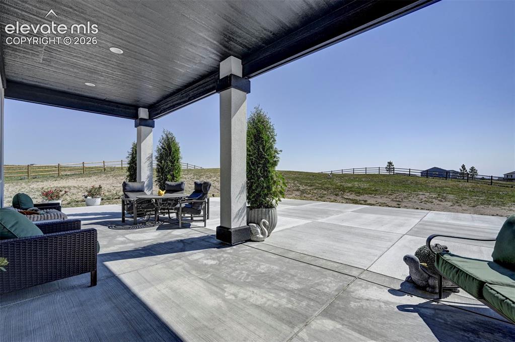 Image 42 of 45: Expansive covered patio