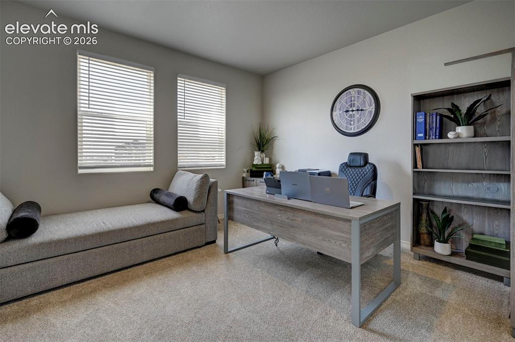Image 7 of 45: Dedicated office space with french doors