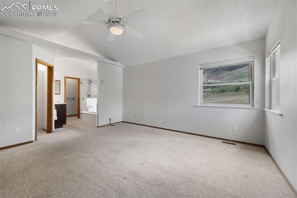Image 19 of 50: VIEWS! and vaulted ceiling.