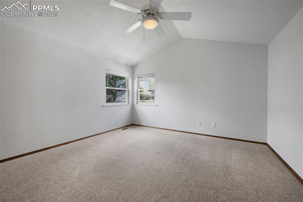 Image 20 of 50: VIEWS! and vaulted ceiling.
