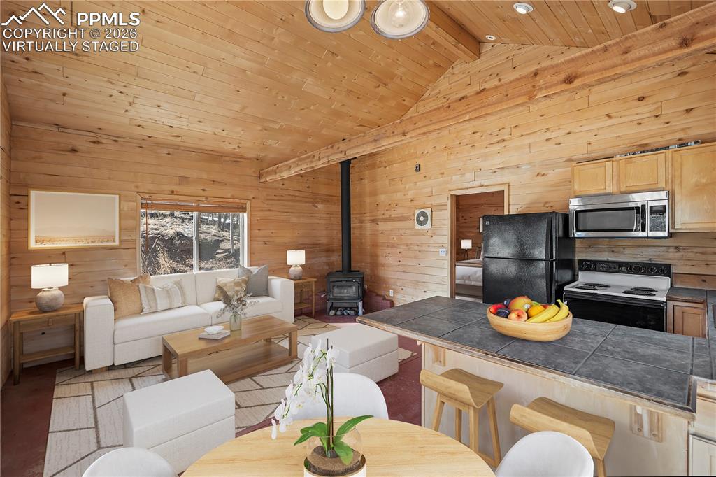 Image 2 of 10: VIRTUALLY STAGED - Living Room & Kitchen