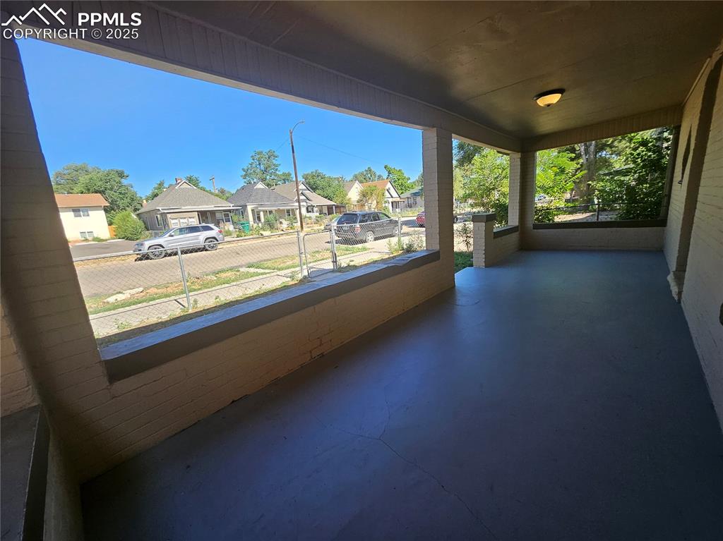 Image 3 of 23: Sunroom featuring a residential view
