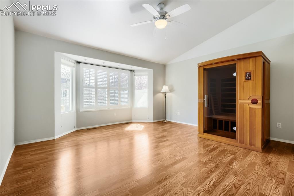 Image 12 of 31: Dining area featuring breakfast bar and tile flooring. Plantation shutters 