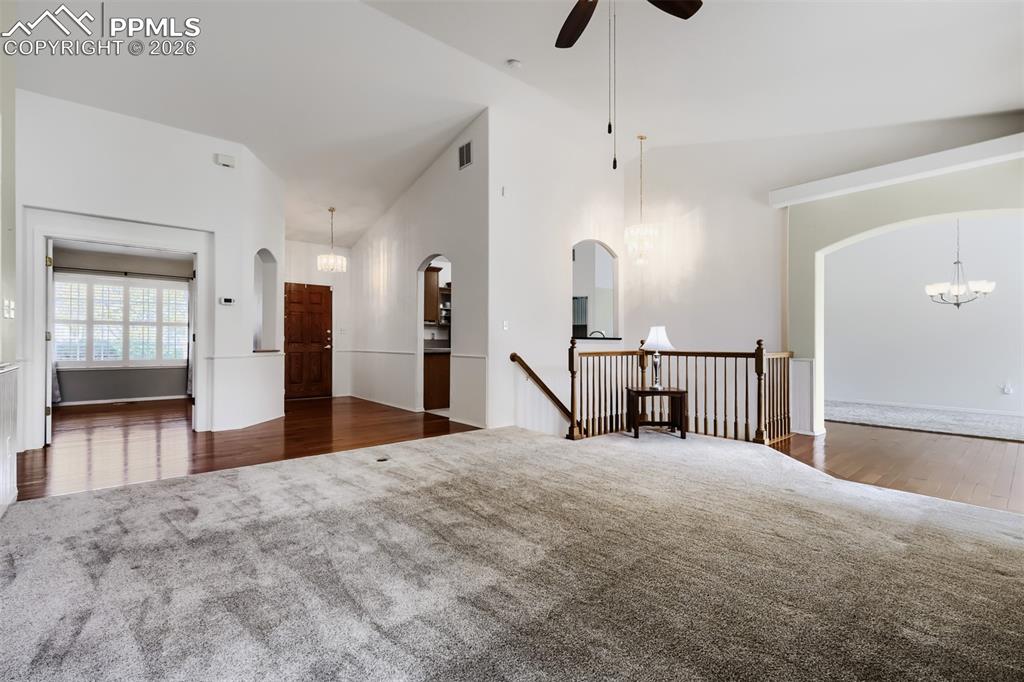 Image 4 of 31: The exterior includes brick accents, a covered front porch with gate access