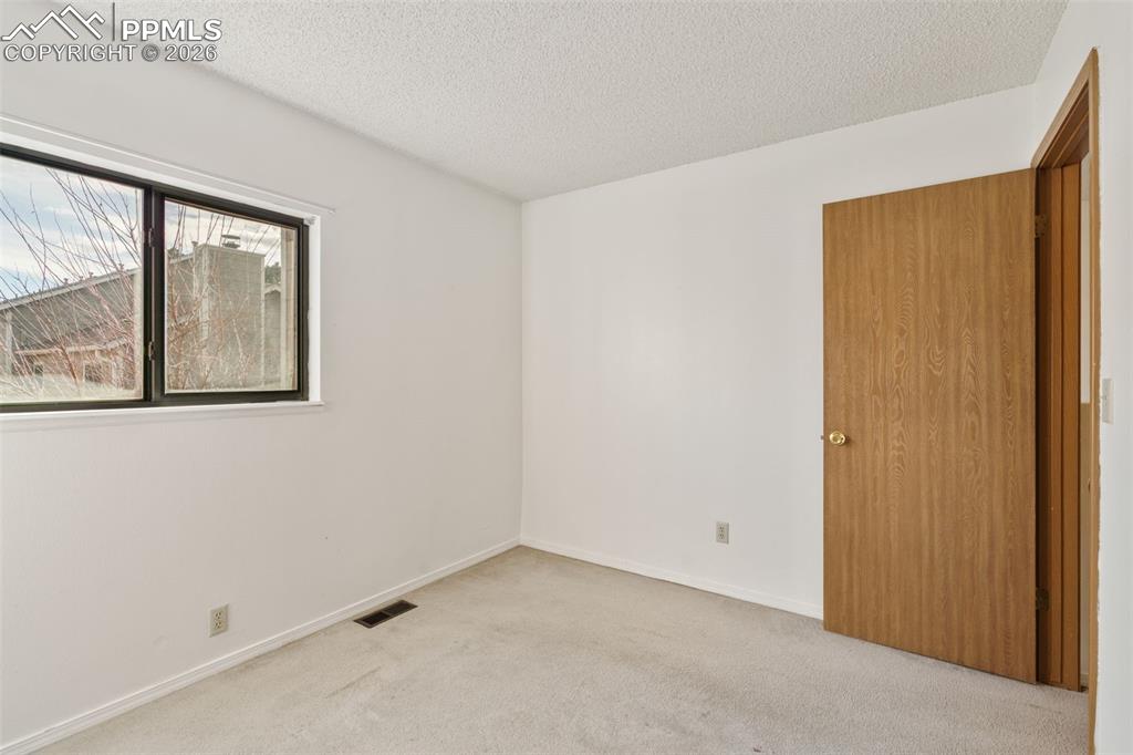 Image 30 of 34: Bedroom