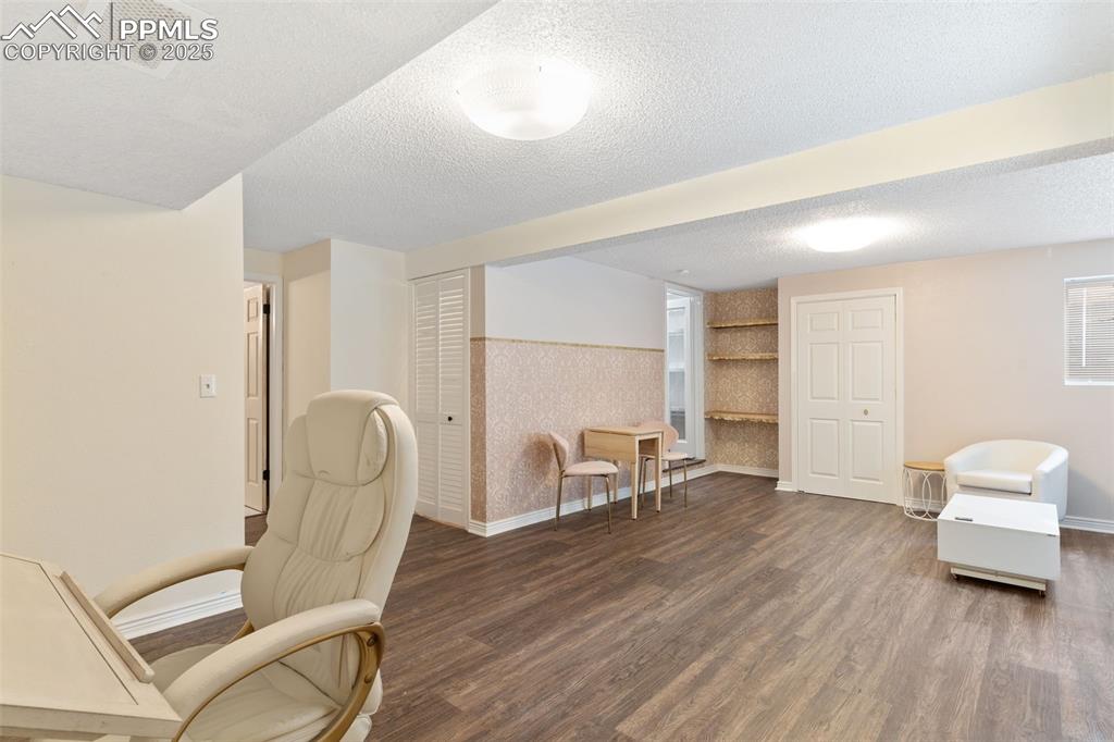 Image 25 of 34: Light and bright additional flex-living area in the basement featuring luxu