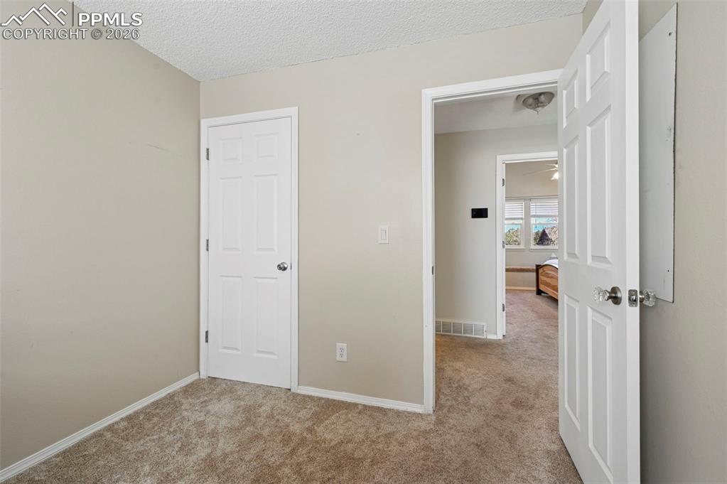 Image 19 of 28: Bedroom