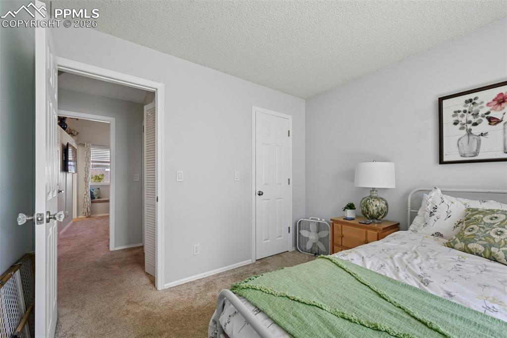 Image 21 of 28: Bedroom