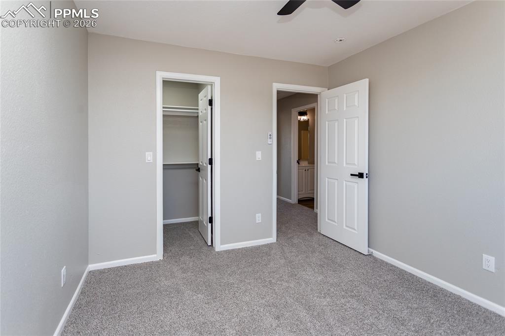 Image 24 of 42: shows the walk-in closet.