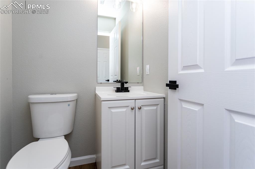 Image 8 of 42: Powder bath is just off the entry.