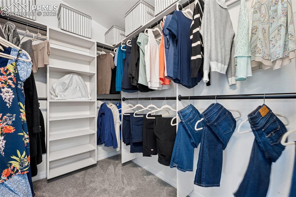 Image 30 of 50: Walk in closet featurin