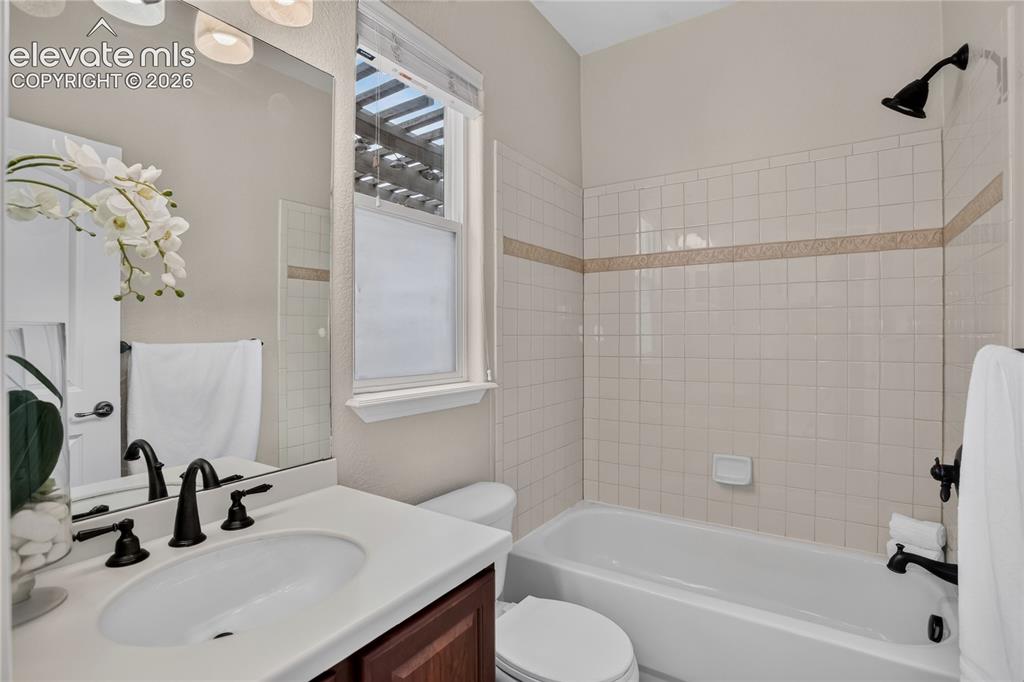 Image 10 of 26: Full guest bath - main level
