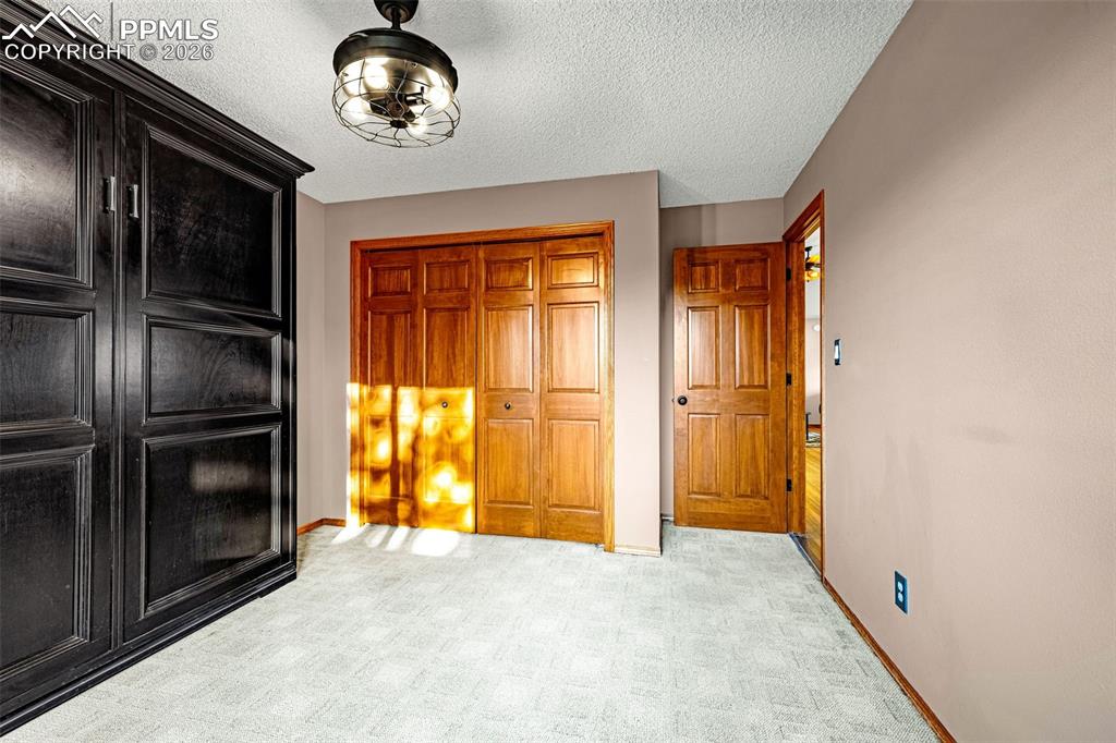 Image 30 of 39: Built in Murphy Bed in second bedroom