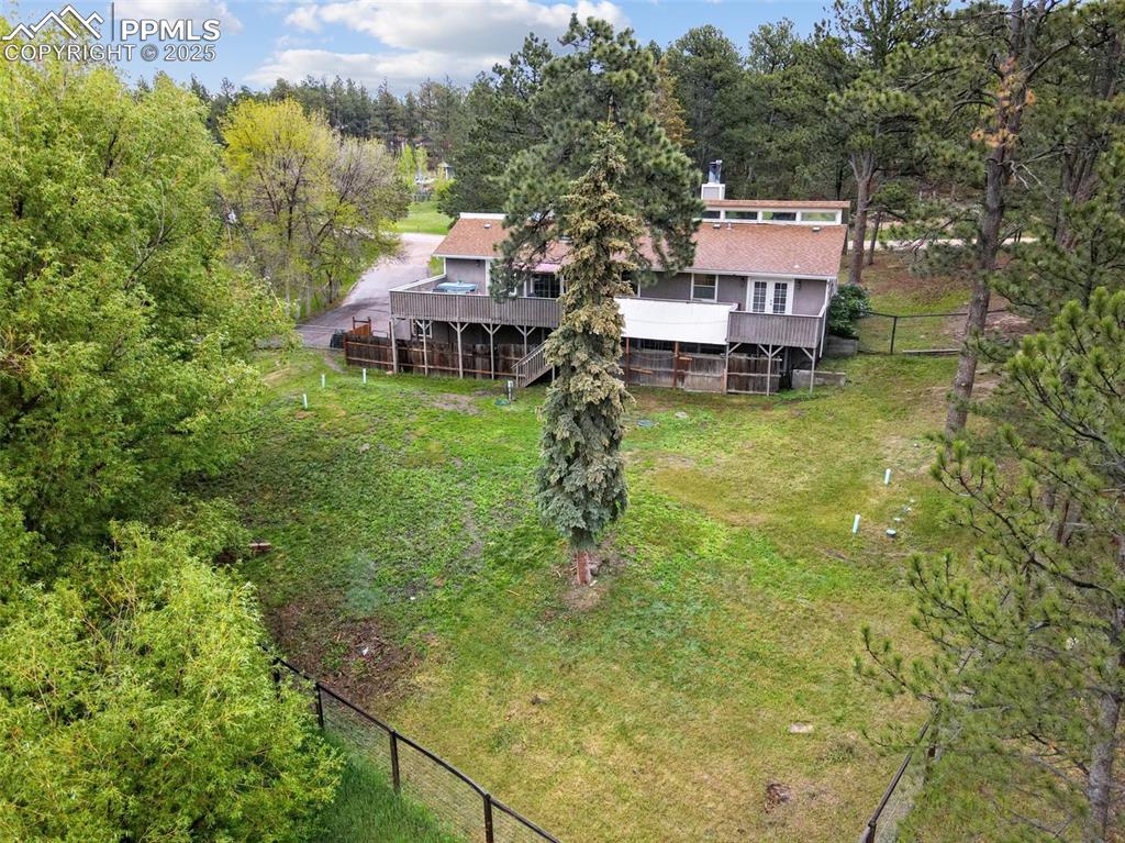 Image 35 of 38: Aerial view of property and surrounding area