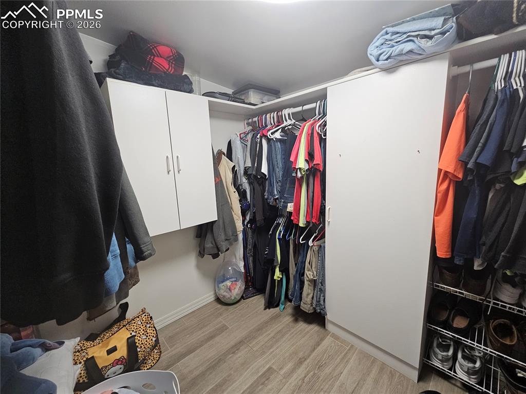 Image 19 of 28: Walk-In Closets