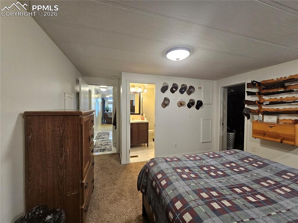 Image 20 of 28: Master bedroom