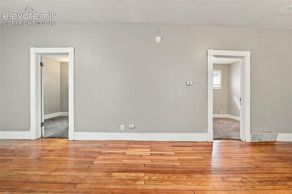Image 14 of 34: Wood-finish flooring