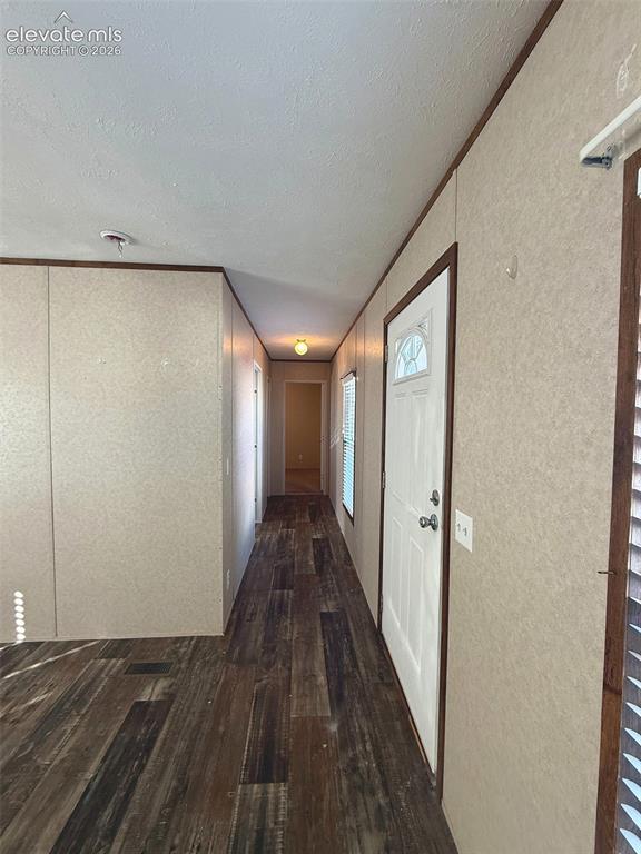 Image 18 of 28: HALLWAY TO 2 BEDS AND 1 BATH