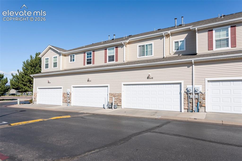 Image 25 of 26: You will absolutely love this spacious upper level laundry room! So much sp
