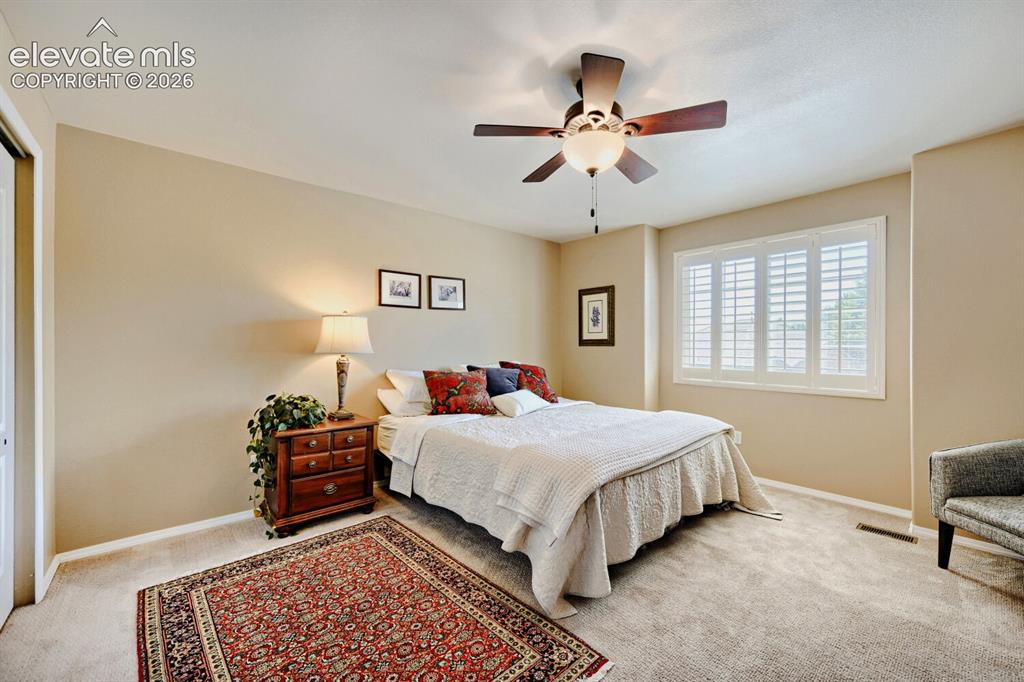 Image 21 of 39: secondary upper bedroom