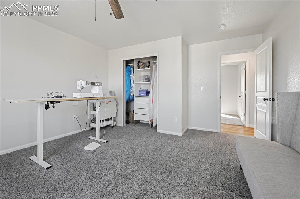 Image 22 of 37: Office featuring light carpet and ceiling fan