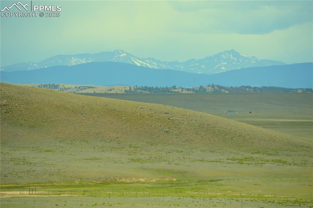 Caption: Mountain view featuring rural landscape
