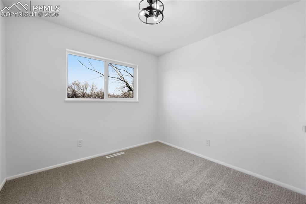 Image 21 of 30: Bedroom